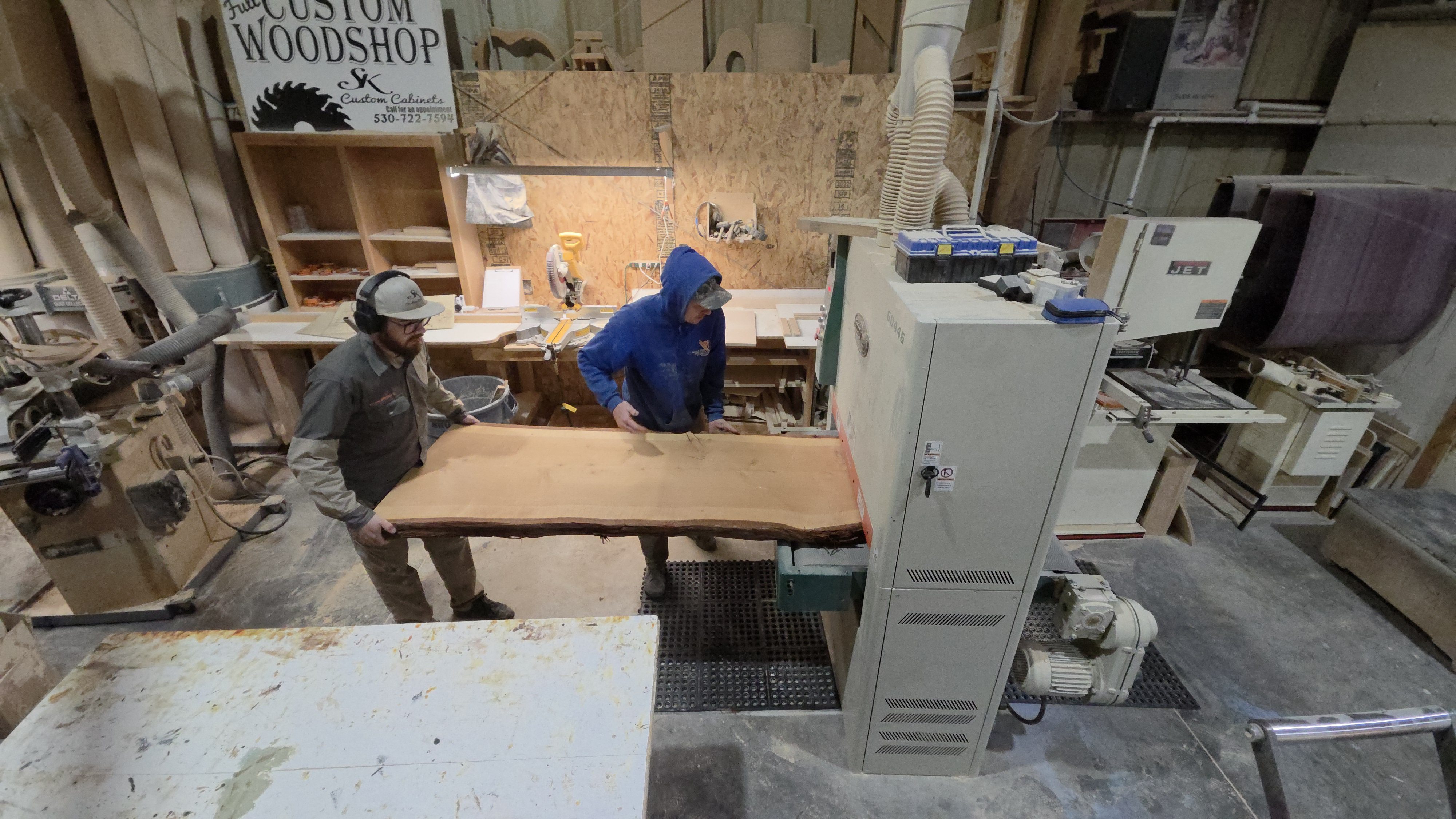 Workers in the SK Custom Cabinets shop